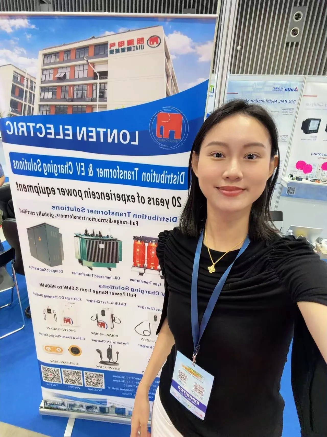LONTEN Electric representative at Vietnam ETE 2026 with distribution transformer and EV charging solutions display.
